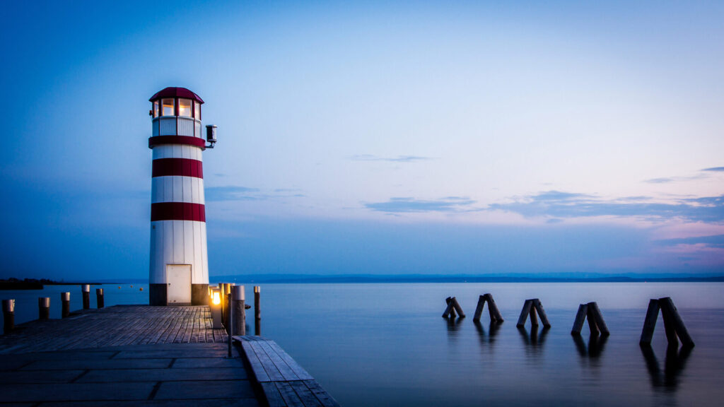picture of a lighthouse at night